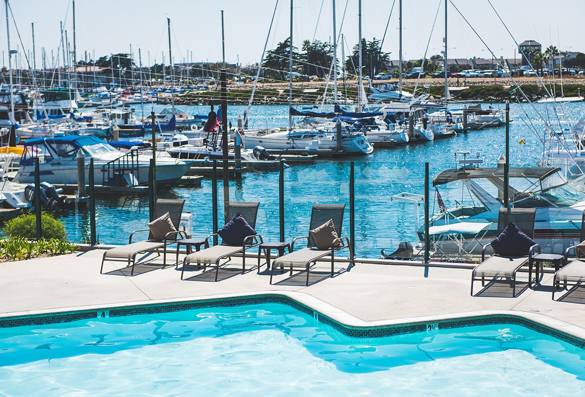 View of pool with marina in the background