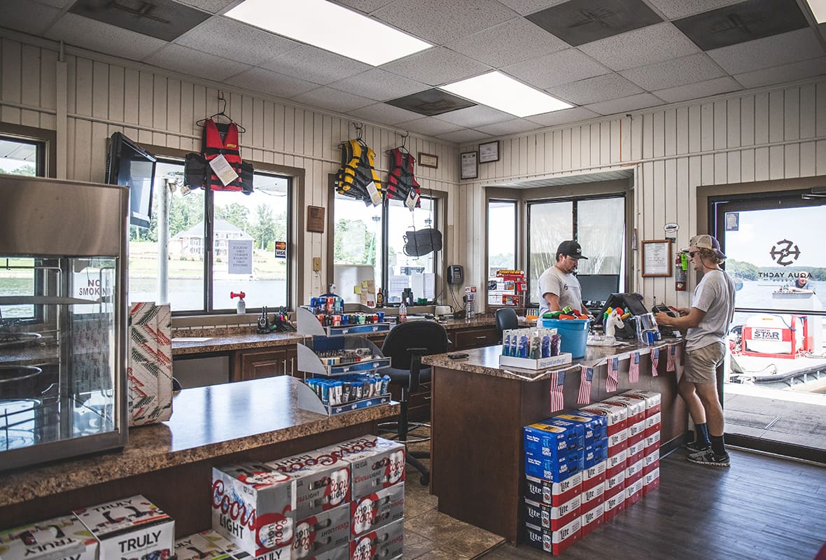 Customer buying product at ship's store