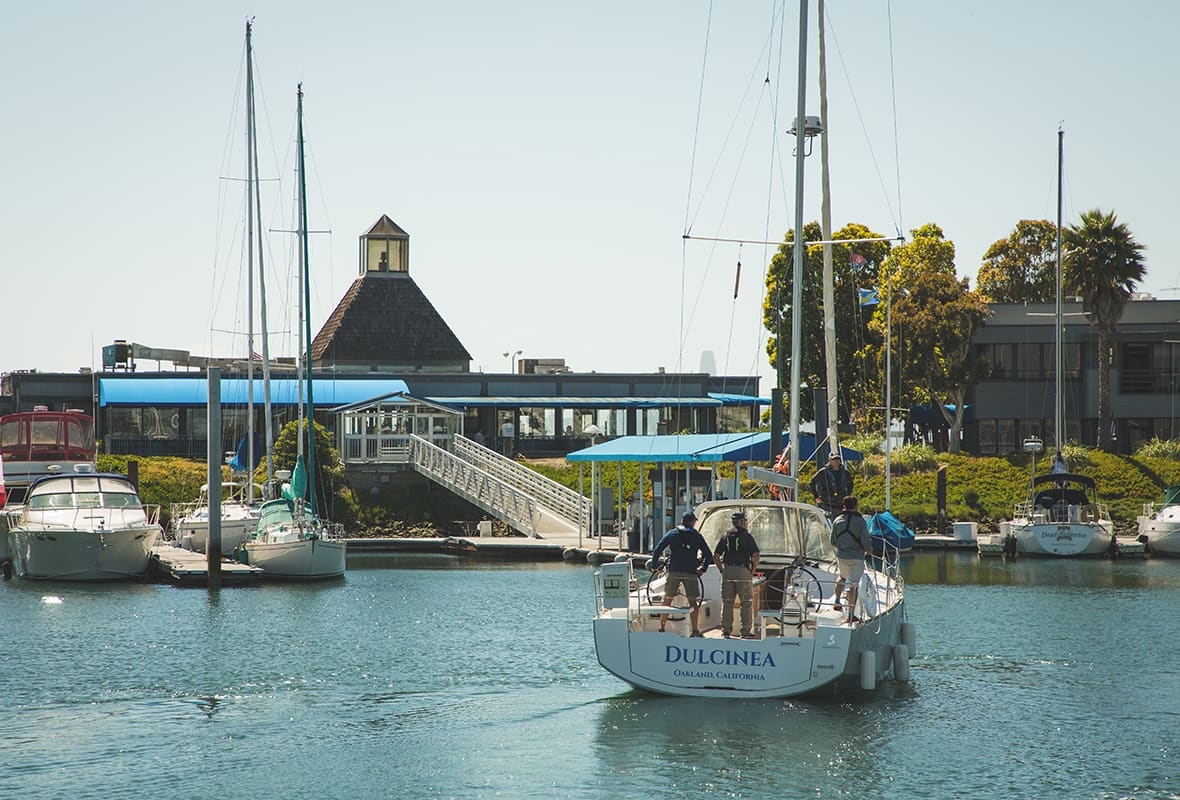 Boat pulling into marina