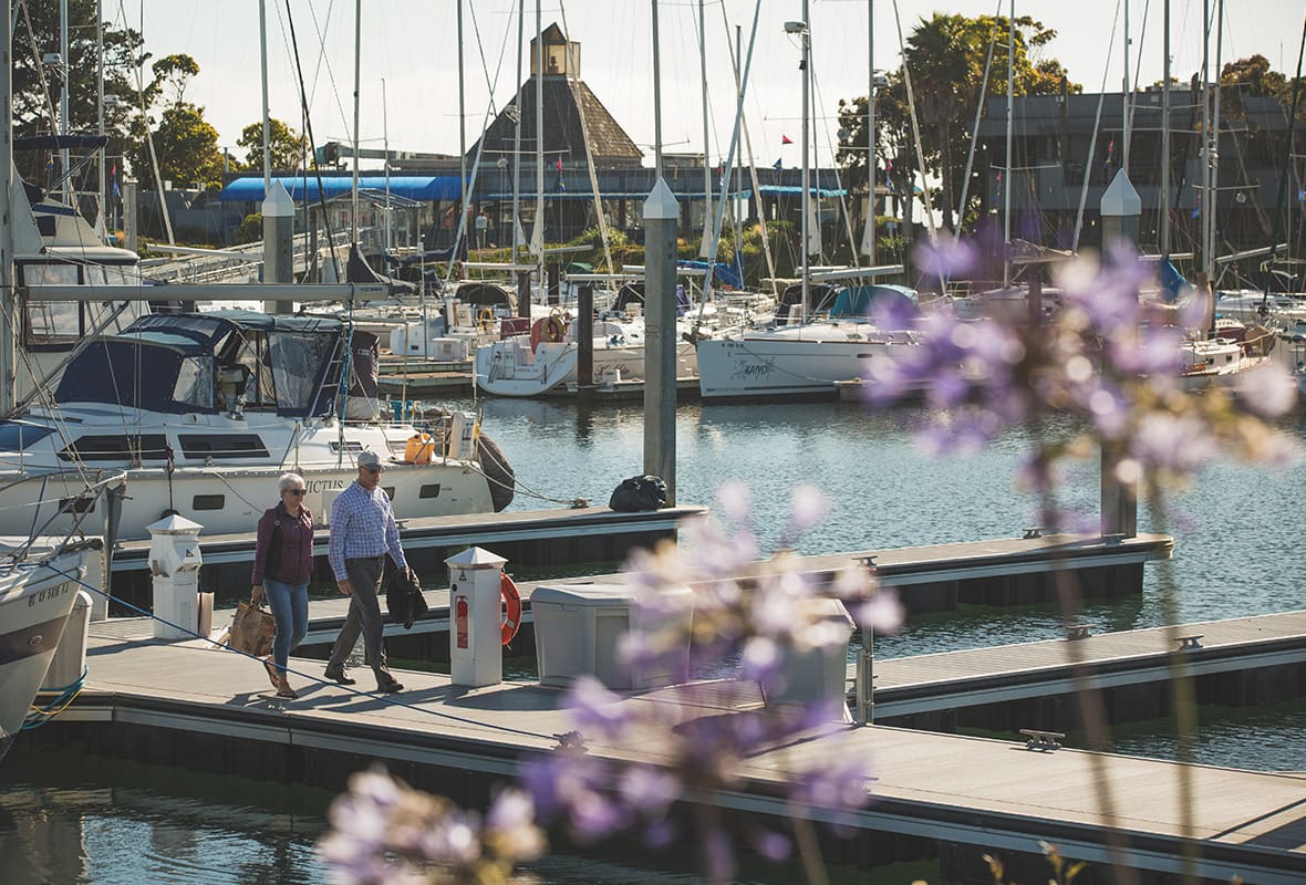 Couple walking on dock