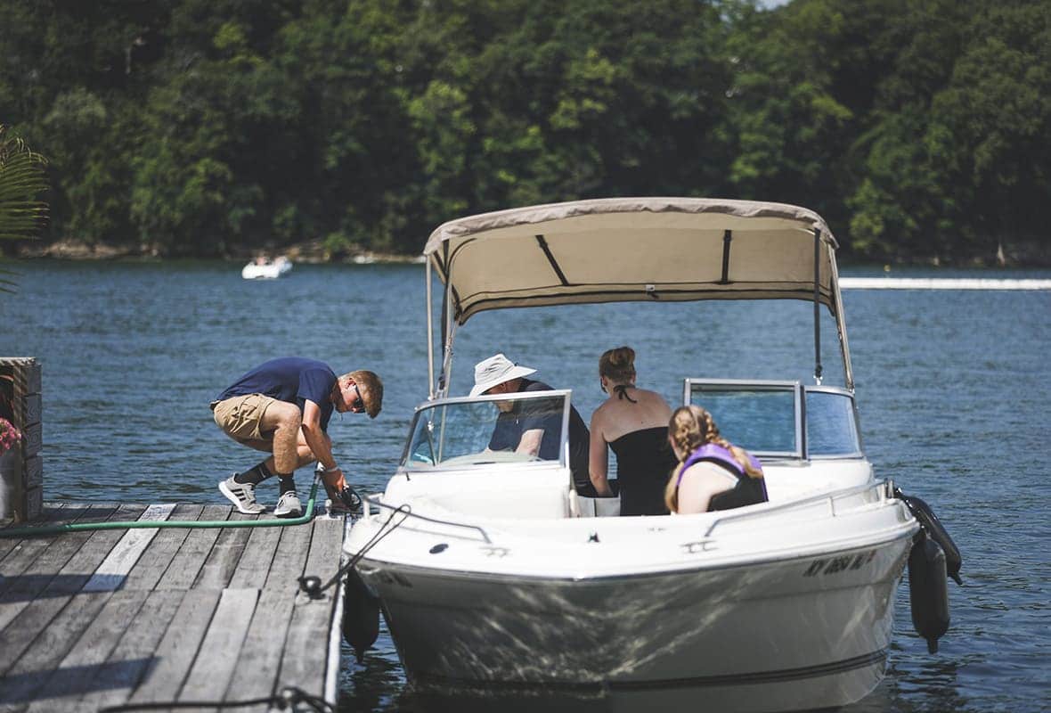 Family get gas at fuel dock