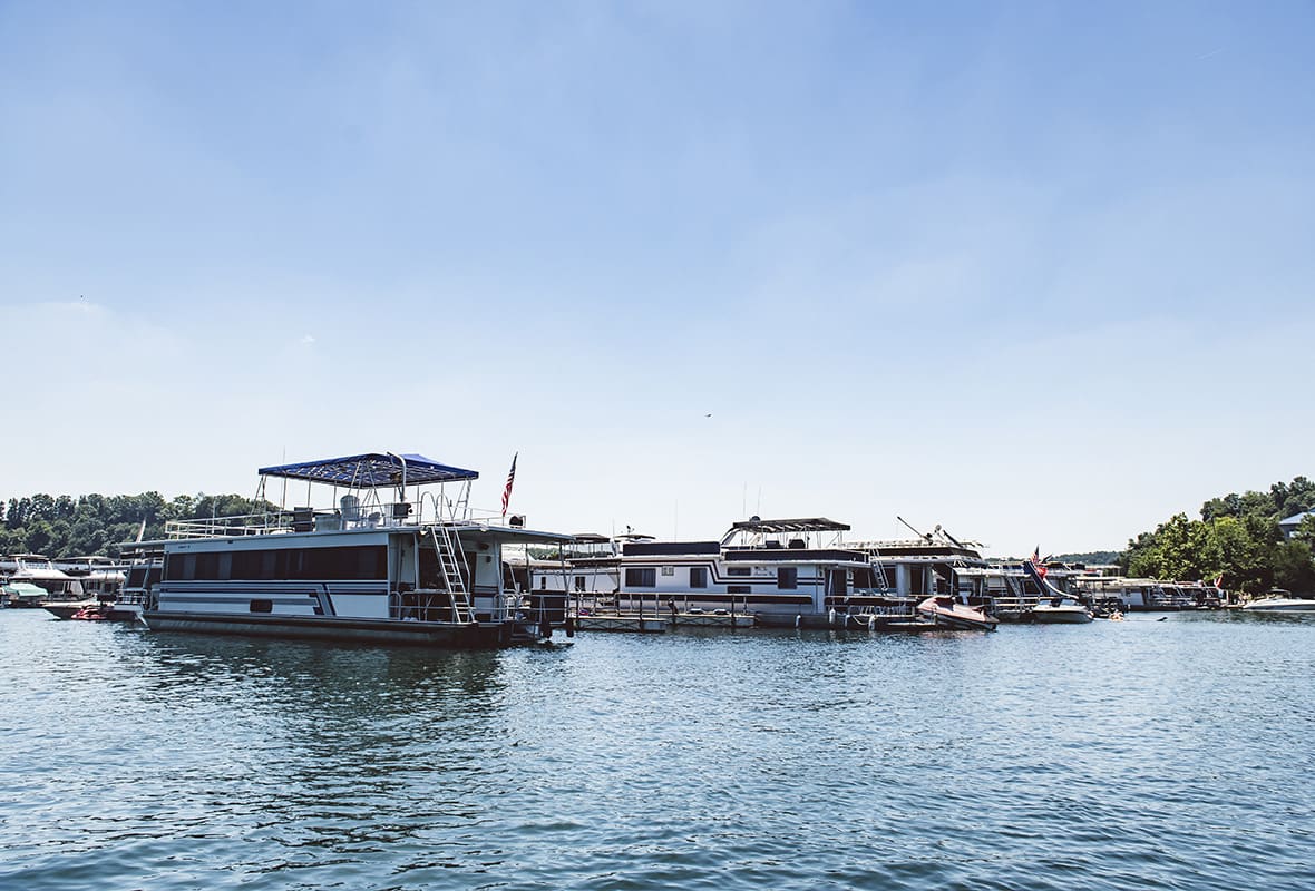 Pontoon boats docked at marina
