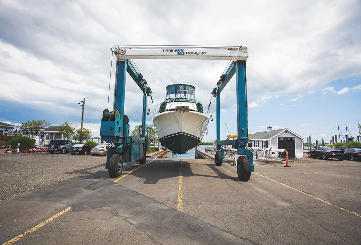 Boat being lifted from water