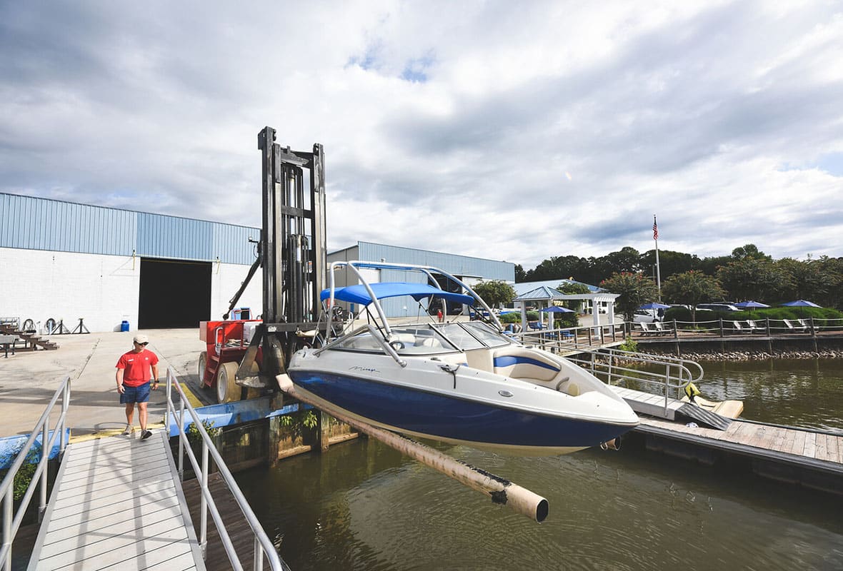 safe harbor skippers landing boat being lifted into water