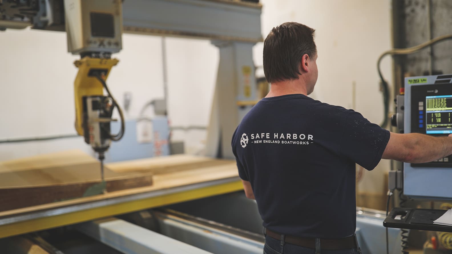 man working on fiberglass