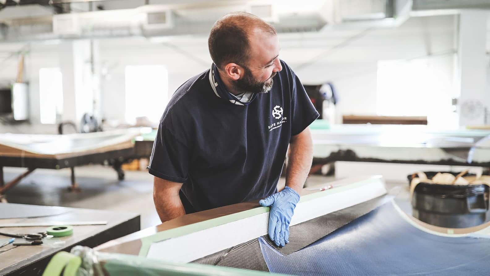 team repairing fiberglass