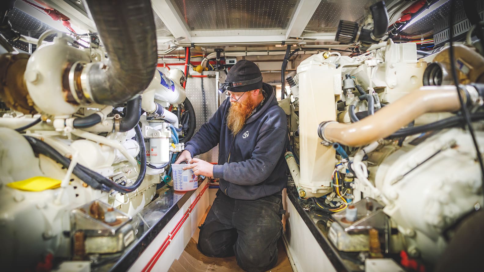 man repairing plumbing